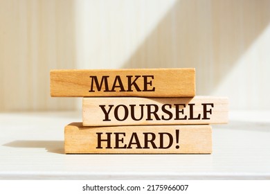 Wooden blocks with words 'Make Yourself Heard'.