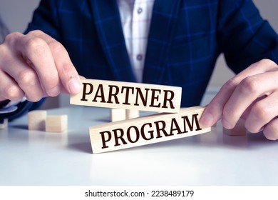 Wooden blocks with words 'Partner Program'. - Shutterstock ID 2238489179
