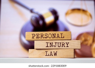 Wooden blocks with words 'Personal Injury Law'. Legal concept - Shutterstock ID 2291883009