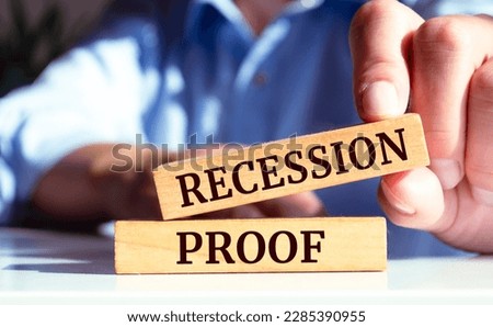 Wooden blocks with words 'Recession proof'. Business concept