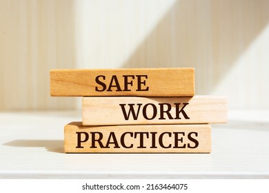 Wooden blocks with words 'Safe work practices'. - Shutterstock ID 2163464075