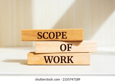 Wooden blocks with words 'Scope of work'. Business concept