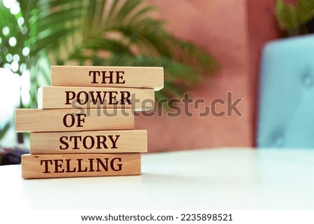 Wooden blocks with words 'THE POWER OF STORYTELLING'.
