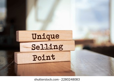 Wooden blocks with words 'Unique Selling Point'. USP - Shutterstock ID 2280248083