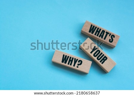 Wooden blocks with words 'What's Your Why?'.