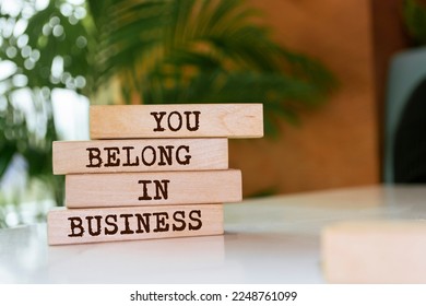 Wooden blocks with words 'You belong in business'. Business concept - Shutterstock ID 2248761099