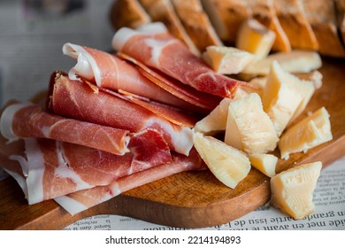 Wooden board with cheese and ham. Board with jamon and cheese. Aperitif on the board. Jamon with bruschetta and parmesan.Delicious appetizer for wine.Italian appetizer. Jamon and salami with cheese. - Shutterstock ID 2214194893