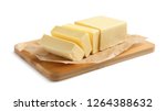 Wooden board with cut block of butter on white background