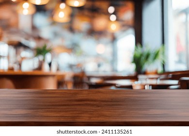 Photo of Wooden board empty table background. abstract blurred cafe background