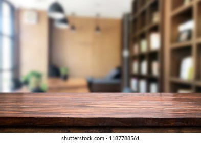 Wooden board empty Table Top And Blur Interior over blur in coffee shop Background, Mock up for display of product. - Powered by Shutterstock