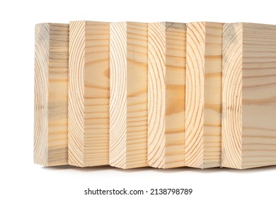 Wooden Boards On White In A Woodworking Industry. Stacks With Pine Lumber. Folded Edge Board. Timber For Construction.