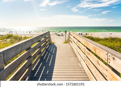 Wooden Boardwalk to Indian rocks beach in Florida, USA