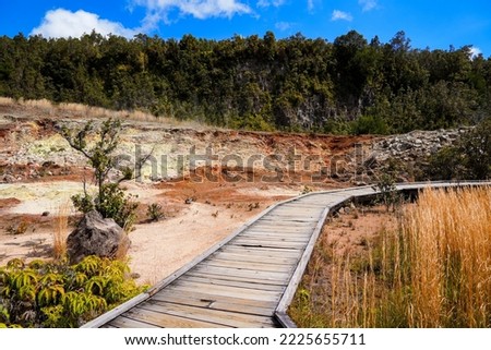 Wooden boardwalk on the Sulphur Banks trail in the Kilauea crater in the Hawaiian Volcanoes National Park on the Big Island of Hawai'i in the Pacific Ocean