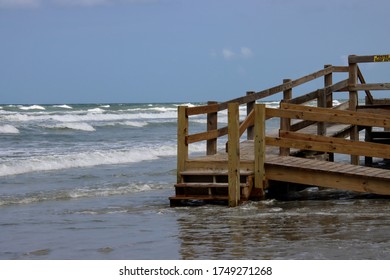 Wooden boardwalk steps give walkover access to beach. - Shutterstock ID 1749271268
