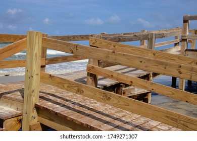 Wooden boardwalk steps give walkover access to beach. - Shutterstock ID 1749271307