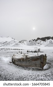 A Wooden Boat Hull Beached On Deception Island, A Former Whaling Station.