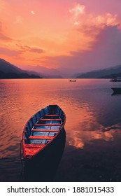 Wooden Boat In Lake Sunset 