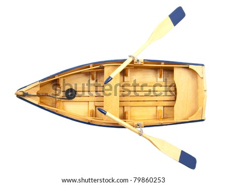 Wooden boat with paddles isolated over white