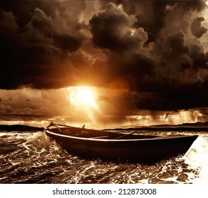 Wooden boat in a stormy sea 