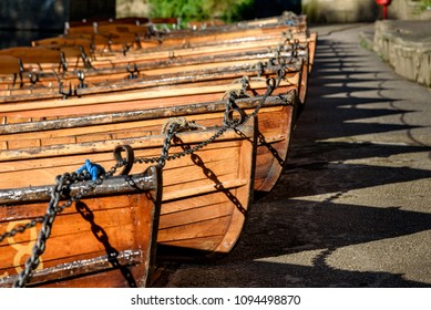 Wooden Boats Docked In A Row At Durham City UK