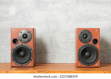 Wooden bookshelf speaker for home entertainment. Speaker in the room.
