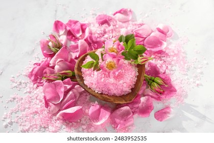 wooden bowl of aromatic sea salt, pink wild rose flowers on abstract marble background. Spa, Wellness, relax, Aromatherapy, healthcare concept. Natural herb cosmetic with rose flowers. - Powered by Shutterstock