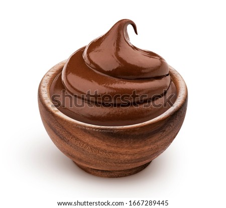 Wooden bowl of chocolate cream isolated on white background with clipping path