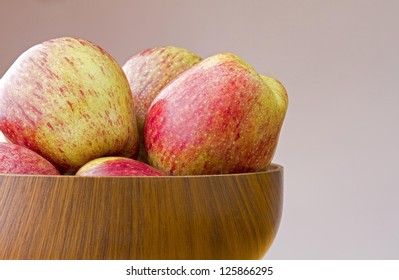 Wooden Bowl Of Fresh Ripe Cameo Apples