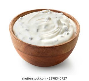 Wooden bowl of fresh sour cream dip sauce with herbs isolated on white background - Powered by Shutterstock