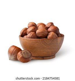 Wooden Bowl Full Of Hazelnuts Isolated On White. Deep Focus