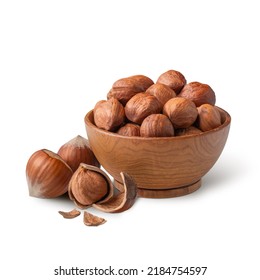 Wooden Bowl Full Of Hazelnuts Isolated On White. Deep Focus