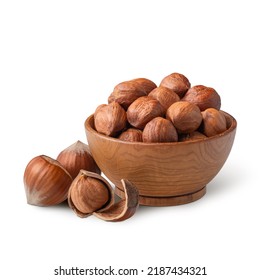 Wooden Bowl Full Of Hazelnuts Isolated On White. Deep Focus