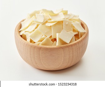 Wooden Bowl Of Parmesan Cheese Flakes