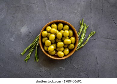 Wooden Bowl Of Pickled Green Olives, Top View