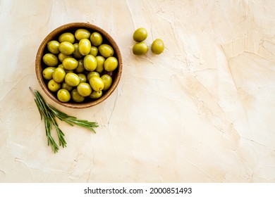 Wooden Bowl Of Pickled Green Olives, Top View