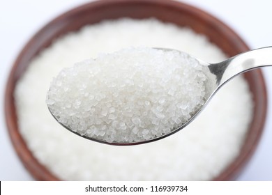 Wooden Bowl Of Sugar With Metal Spoon