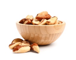 Wooden Bowl Of Tasty Brazil Nuts On White Background