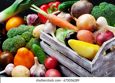 Wooden Box With Autumn Harvest Farm Vegetables And Root Crops. Healthy And Organic Food Background.