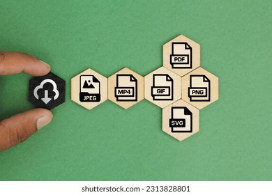wooden box with save file icon or download file format JPEG, PNG, GIF, PDF, SVG And MP4 file. file icons are arranged into folders. Concept document management system or DMS. - Shutterstock ID 2313828801