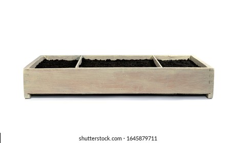 Wooden Box With Soil For Growing Plants Isolated On White Background. Garden Box For Planting Herbs On Window Sill At Home.