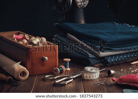 Image, Stock Photo Dressmaker cutting a cloth