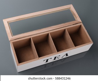 Wooden box for tea with four compartments