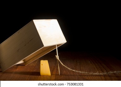 Wooden Box As A Trap On A Black Background