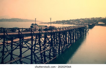 wooden bridge across the river ,vintage style - Shutterstock ID 202029364