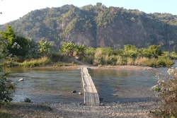 The Wooden Bridge Across The Stream Of Long Town, Luang Namtha Province, Laos, 2000