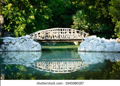  wooden bridge in the Athens National Garden , known as the Royal Garden , Greece 