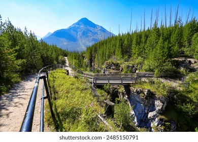 Wooden bridge crossing Marble Canyon above the Kootenay River at the north end of Kootenay National Park in the Canadian Rockies of British Columbia, Canada - Powered by Shutterstock