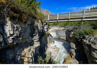 Wooden bridge crossing Marble Canyon above the Kootenay River at the north end of Kootenay National Park in the Canadian Rockies of British Columbia, Canada - Powered by Shutterstock