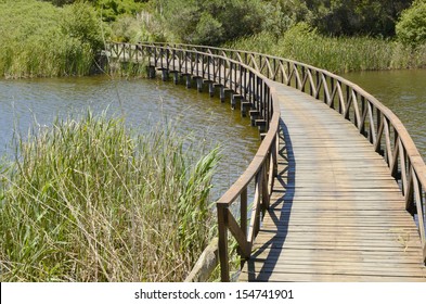 Wooden Bridge In Golf Course Lake  In Andalusia