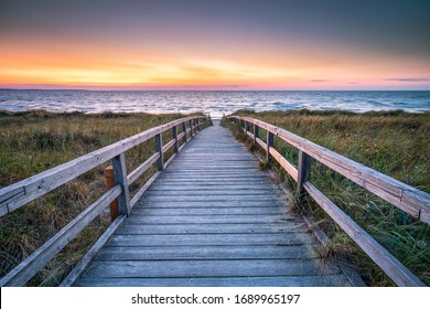 Wooden bridge leading to the beach, North Sea, Germany - Powered by Shutterstock